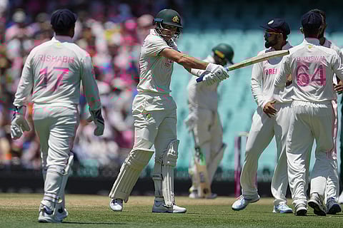 IND Vs AUS 5th Test Day 3: Australia's Marnus Labuschagne, centre, reacts after he was dismissed