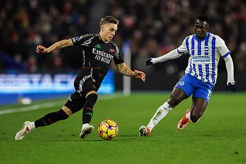 EPL 2024-25: Brighton's Yankuba Minteh duels for the ball with Arsenal's Leandro Trossard