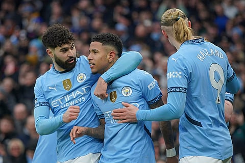 EPL 2024-25: Manchester City's Savinho, center, celebrates with teammates after scoring the opening goal