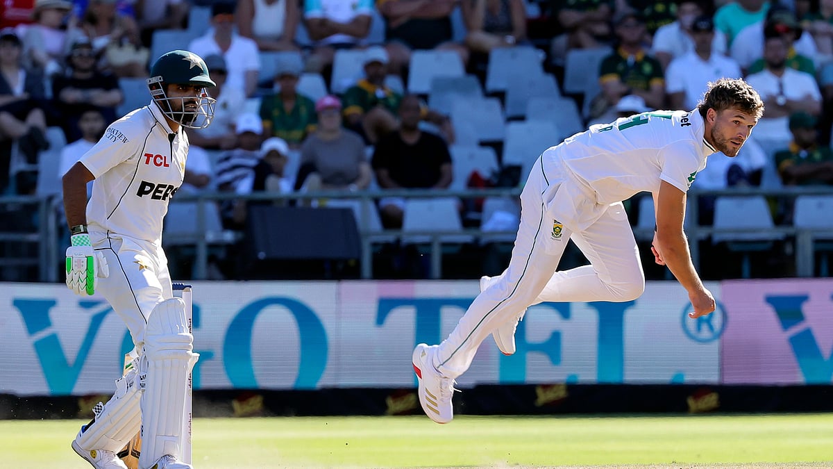 AP Photo/Halden Krog : Pakistan's Babar Azam watches as South Africa's Wiaan Mulder bowls during the second day of the second test match between South Africa and Pakistan in Cape Town.