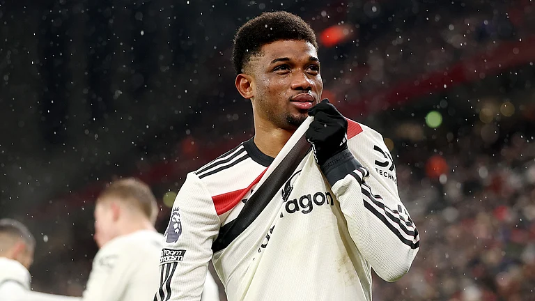 Amad Diallo celebrates after scoring against Liverpool - null