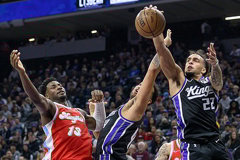 NBA 2024-25: Grizzlies forward Jaren Jackson Jr. (13) battles for a rebound with Sacramento Kings players