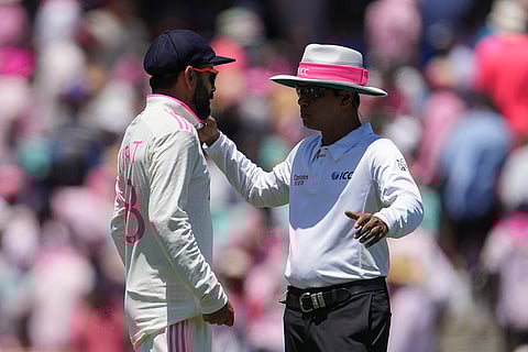 IND Vs AUS 5th Test Day 3: India's Virat Kohli, left, talks with umpire Sharfuddoula Saikat