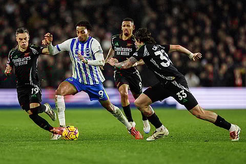 EPL 2024-25: Brighton's Joao Pedro is tackled by Arsenal's Leandro Trossard
