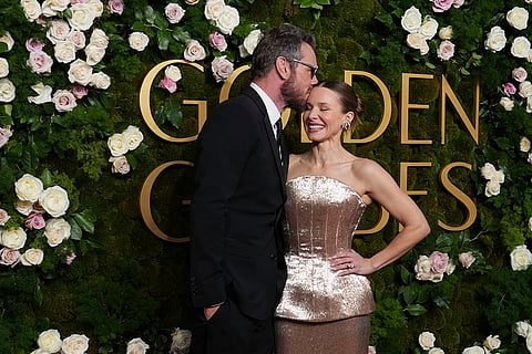 Dax Shepard, left, and Kristen Bell