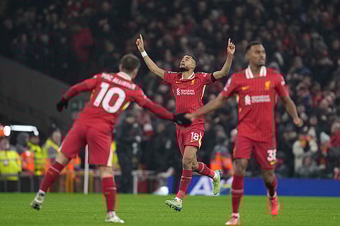 EPL 2024-25: Liverpool's Cody Gakpo, center, celebrates after scoring his side's first goal
