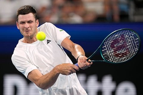 United Cup Tennis: Hubert Hurkacz hits a backhand to Taylor Fritz