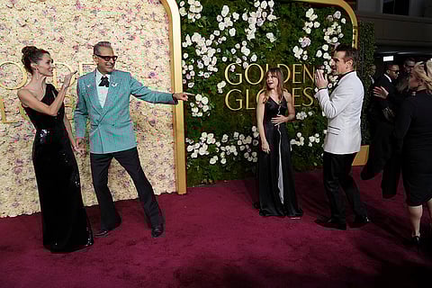 Emilie Livingston, from left, Jeff Goldblum, and Colin Farrell