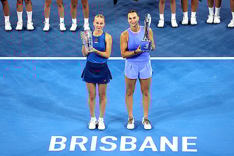 Brisbane International Tennis: Polina Kudermetova and Aryna Sabalenka pose with their trophies
