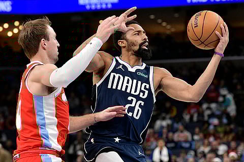 NBA 2024-25: Mavericks guard Spencer Dinwiddie (26) handles the ball