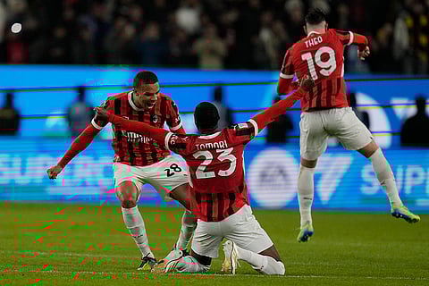 Italian Super Cup Final: AC Milan's Fikayo Tomori, center, celebrates with teammates after winning the final