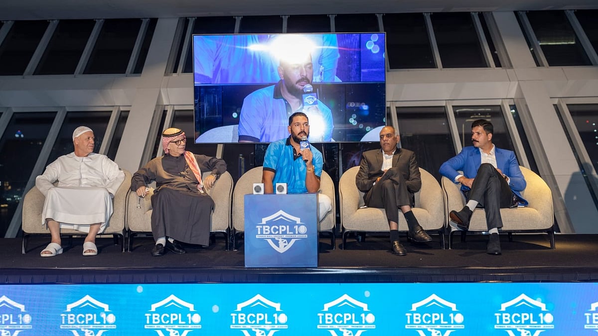 Special Arrangement : Former India cricketer Yuvraj Singh (c) speaks to the media at the launch of Tennis Ball Cricket Premier League