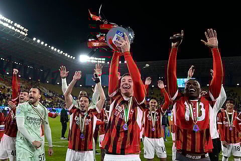 Italian Super Cup Final: AC Milan's Francesco Camarda celebrates with teammates after the match