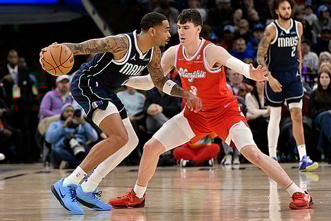 NBA 2024-25: Mavericks forward P.J. Washington handles the ball against Grizzlies