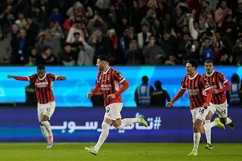 Italian Super Cup Final: AC Milan's Theo Hernandez, center, celebrates after scoring his sides first goal