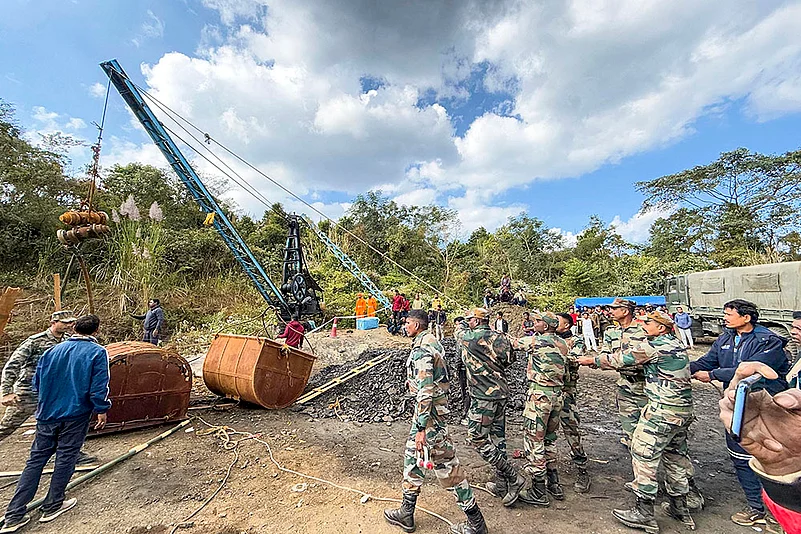 Rescue operation underway Labourers trapped inside a coal mine in Assam photo: 6