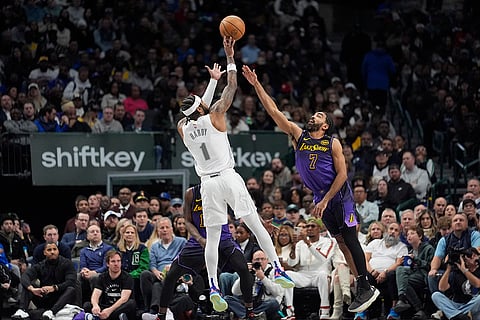NBA 2024-25: Mavericks guard Jaden Hardy (1) shoots against Lakers guard Gabe Vincent