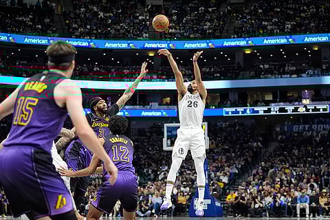 NBA 2024-25: Mavericks guard Spencer Dinwiddie (26) shoots against Los Angeles Lakers defenders
