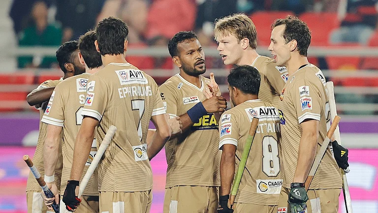 Tamil Nadu Dragons rejoice after scoring a goal against Team Gonasika in the Hockey India League. - Hockey India