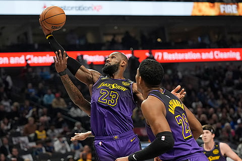 NBA 2024-25: Lakers forward LeBron James (23) grabs a rebound