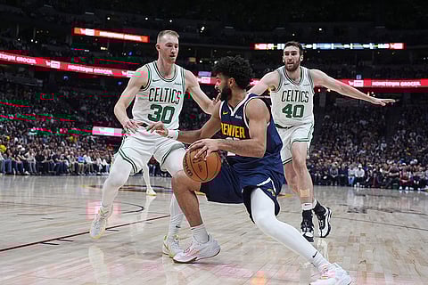 NBA 2024-25: Nuggets guard Jamal Murray, front drives to the basket