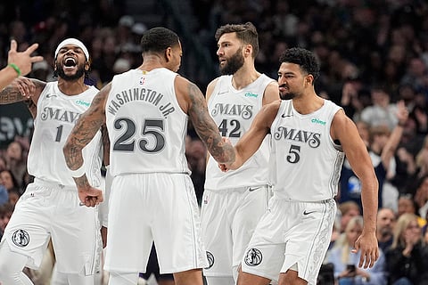 NBA 2024-25: Dallas Mavericks guard Quentin Grimes (5) celebrates with teammates
