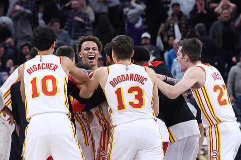 NBA 2024-25: Hawks celebrate a game winning half court shot against the Jazz