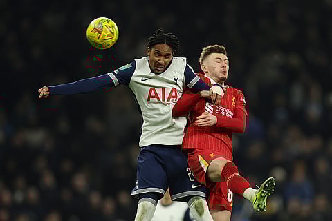 EFL Cup Semi-Final: Tottenham's Djed Spence jumps for the ball with Liverpool's Conor Bradley