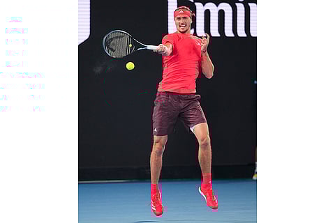 Australian Open 2025: Alexander Zverev plays a forehand return to Novak Djokovic