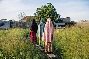 | Photo: Getty Images : Lonely Lives: Three young girls
walk back home in Maiduguri, Nigeria