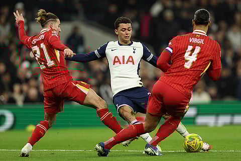 EFL Cup Semi-Final: Liverpool's Kostas Tsimikas and Virgil van Dijk block a shot from Brennan Johnson