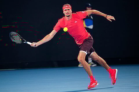 Australian Open 2025: Alexander Zverev plays a forehand return to Novak Djokovic