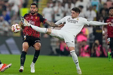 Spanish Super Cup: Real Madrid's Federico Valverde, right, is challenged by Mallorca's Omar Mascarell
