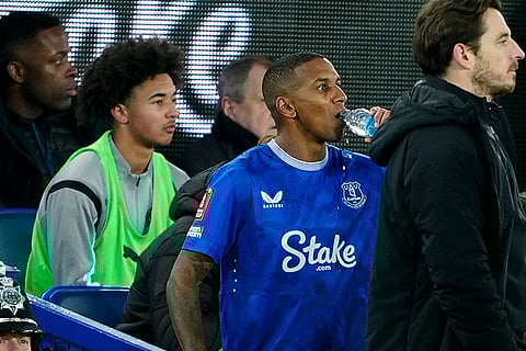 FA Cup 2024-25: Peterborough United's Tyler Young, left, and Everton's Ashley Young