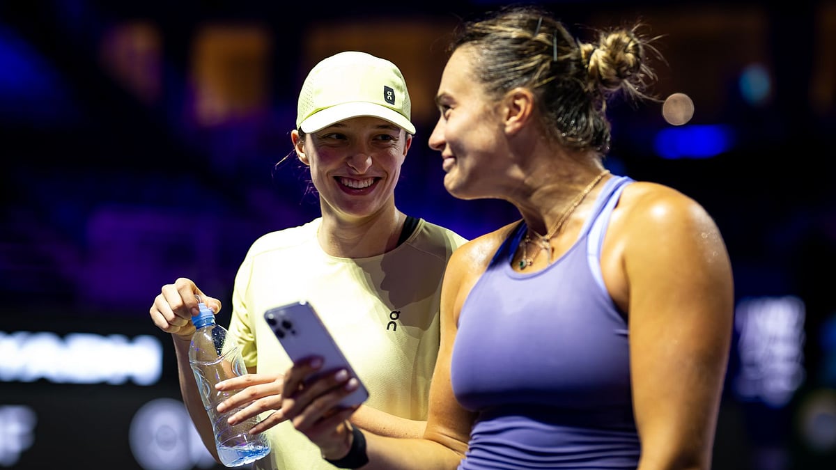 Sabalenka (right) is aiming to match Swiatek by winning three straight titles at the same major - null