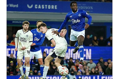 FA Cup 2024-25: Everton's Orel Mangala, right, and Peterborough United's George Nevett 