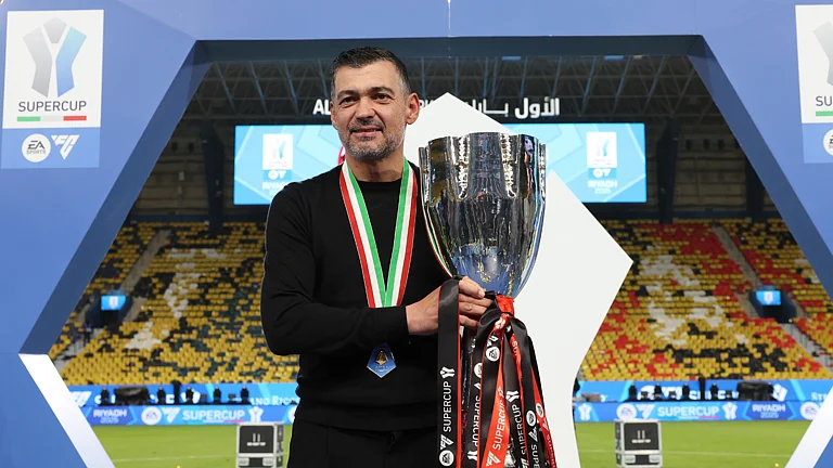 Sergio Conceicao celebrates AC Milan's Supercoppa Italiana triumph - null