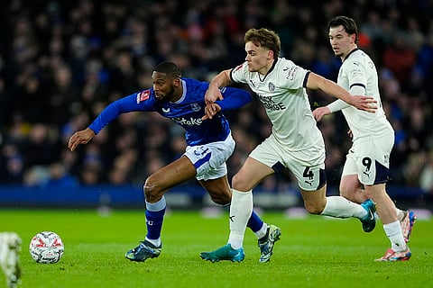 FA Cup 2024-25: Everton's Beto, left, and Peterborough United's Archie Collins battle for the ball 