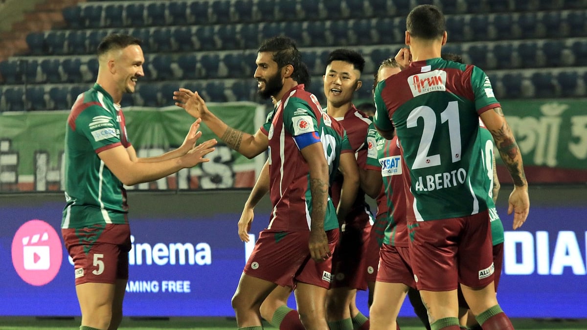 Mohun Bagan celebrate Jamie MacLarens goal against East Bengal
