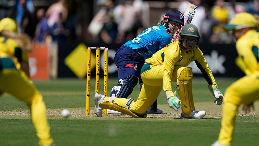 Photo: AP/Rick Rycroft : Tammy Beaumont, center left, turns to watch a ball she has played against Australia during their Women's Ashes one day international match in Sydney.
