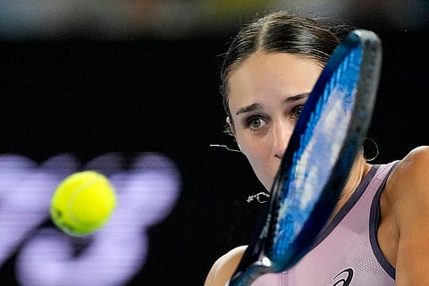 Australian Open 2025: Anca Todoni plays a backhand return to Zheng Qinwen