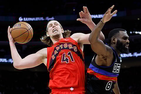 NBA 2024-25: Raptors forward Kelly Olynyk (41) is blocked from taking a shot by Pistons forward