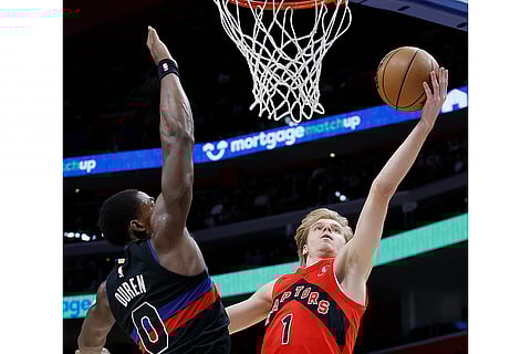NBA 2024-25: Raptors guard Gradey Dick (1) goes in for a layup against Pistons center Jalen Duren