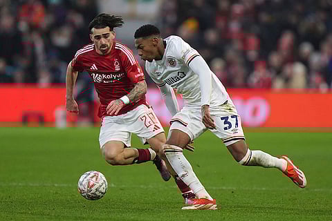 FA Cup Third Round: Luton Town's Zack Nelson and Nottingham Forest's Jota Silva battle for the ball