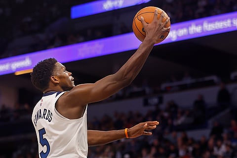 NBA 2024-25: Timberwolves guard Anthony Edwards goes to the basket against the Grizzlies