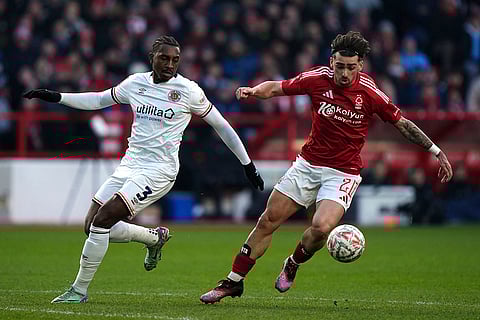 FA Cup Third Round: Luton Town's Amari'i Bell and Nottingham Forest's Jota Silva battle for the ball