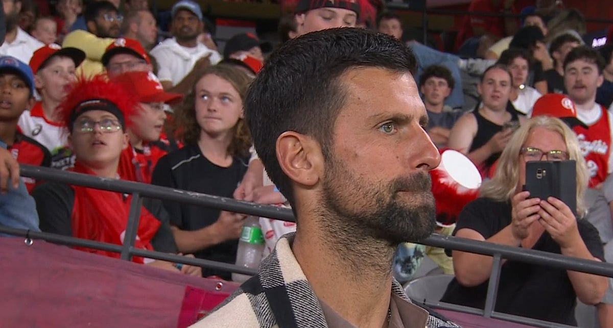 Photo: X | 7Cricket : Novak Djokovic watching a BBL 2024-25 match.