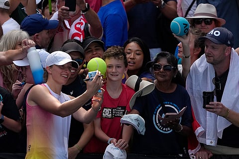 Australian Open 2025: Iga Swiatek takes a selfie with fans after defeating Katerina Siniakova