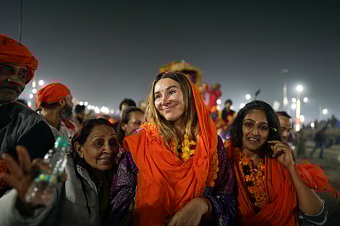 Kumbh Mela 2025: Foreign devotee Iryna Animists, centerwith Indian hindu devotees