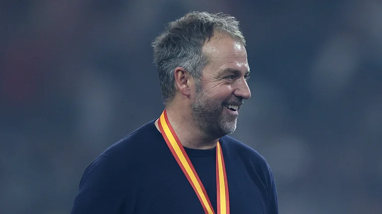 Hansi Flick led Barca to glory - null